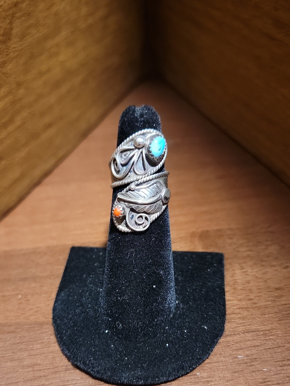 Vintage Southwestern bypass ring features a vibrant turquoise And Coral Accent